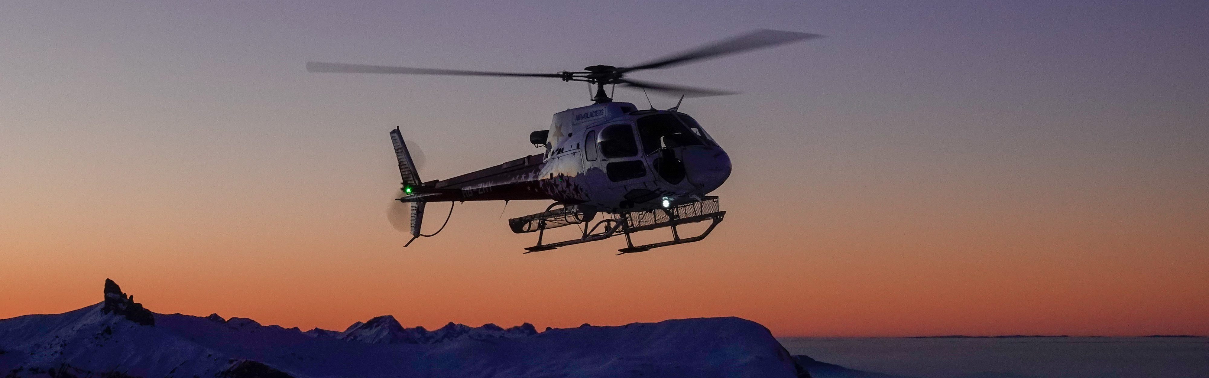 Helicopter scenic flights at Festival International de ballons in Château-d'Oex